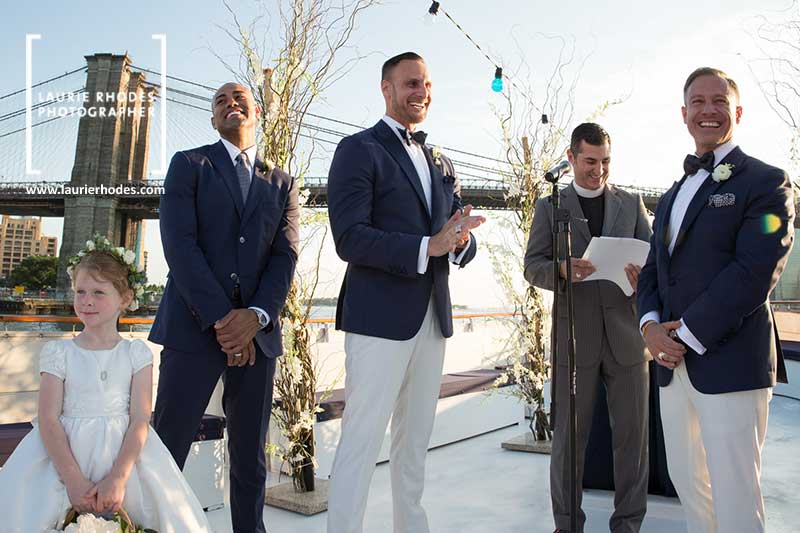 Photo of gay wedding by New York photographer Laurie Rhodes under the Brooklyn Bridge - 5